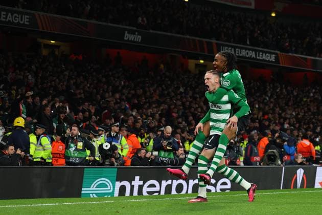 16th March 2023; Emirates Stadium, London, England; Europa League Football, Round of 16, Second Leg, Arsenal versus Sporting Lisbon; Nuno Santos of Sporting Lisbon celebrates with Youssef Chermiti after he scores the winning penalty in the shoot out  ActionPlus12487358 ShaunxBrooks