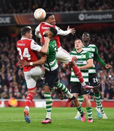 Arsenal v Sporting Clube de Portugal UEFA Europa League Granit Xhaka and Gabriel of Arsenal challenge for a header during the UEFA Europa League Round of 16 Second Leg match at the Emirates Stadium, London Content Not Available For UK Newspapers Copyright: xNigelxBramleyx FIL-18256-0054 UK Newspapers OUT