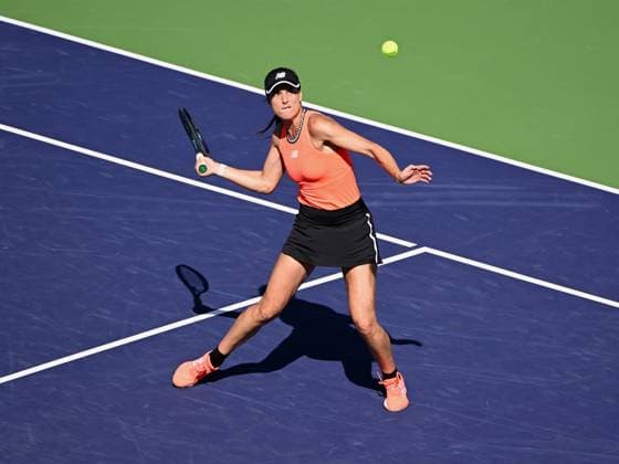 INDIAN WELLS, CA - MARCH 16: Sorana Cirstea of Romania heads towards the net to return the ball during a quarterfinals match at the BNP Paribas Open tennis tournament played on March 16, 2023 at the Indian Wells Tennis Garden in Indian Wells, CA. (Photo by John Cordes Icon Sportswire) TENNIS: MAR 16 BNP Paribas Open Icon506230316068