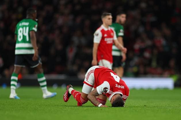 16th March 2023; Emirates Stadium, London, England; Europa League Football, Round of 16, Second Leg, Arsenal versus Sporting Lisbon; Ben White of Arsenal goes down injured  ActionPlus12487435 ShaunxBrooks