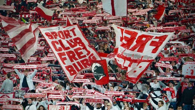 16 03 2023 Freiburg im Breisgau, Baden Württemberg, Germany, Europe Supported and celebrated their team even after the game Fans of Sportclub Freiburg flag, scarves, fan scarf, banner, ultras Football UEFA Europa League 2022 2023 Round of 16 second leg SC Freiburg Juventus Turin, at Europa Park Stadium