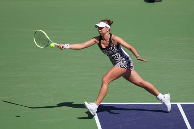 INDIAN WELLS, CA - MARCH 17: Barbora Krejcikova (CZE) stretches for a forehand during the BNP Paribas Open on March 17, 2023 at the Indian Wells Tennis Garden in Indian Wells, CA. (Photo by George Walker Icon Sportswire) TENNIS: MAR 17 BNP Paribas Open Icon230317033