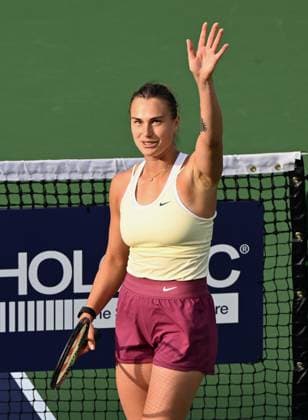 INDIAN WELLS, CA - MARCH 17: Aryna Sabalenka waves to the fans after winning a semifinal match and moving onto the finals of the BNP Paribas Open tennis tournament played on March 17, 2023 at the Indian Wells Tennis Garden in Indian Wells, CA. (Photo by John Cordes Icon Sportswire) TENNIS: MAR 17 BNP Paribas Open Icon506230317114