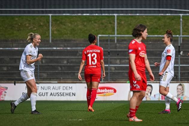 18 03 2023, GER, Soccer, FLYERALARM Womens Bundesliga 2022 2023, 1 FC Köln FC Bayern München Lea Schüller white jersey left, Bayern München and Lina Magull white jersey right, Bayern München celebrate third goal Köln Franz Kremer Stadion Nordrhein Westfalen Germany