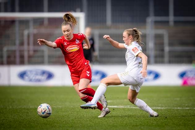 1 Women Bundesliga 1 FC Koeln vs FC Bayern Muenchen, 18 03 2023 Georgia Stanway FC Bayern Muenchen, 31 and Weronika Zaistowska 24, 1 FC Koeln in duel during the match 1 FC Koeln vs FC Bayern Muenchen on matchday 15 of the Women Football Bundesliga on 18 03 2023 at Franz Kremer Stadion in Koeln North Rhine Westphalia DFL REGULATES PROHIBIT ANY USE OF PHOTOGRAPHS AS IMAGE SEQUENCES AND OR QUASI VIDEO Copyright: xBEAUTIFULxSPORTS AxelxKohringx