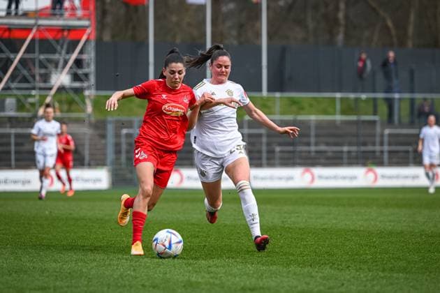 18 03 2023, GER, Football, FLYERALARM Womens Bundesliga 2022 2023, 1 FC Cologne FC Bayern Munich Manjou Wilde left, Cologne and Sarah Zadrazil right, Bayern Munich in duel Cologne Franz Kremer Stadium North Rhine Westphalia Germany