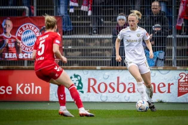 1 Women Bundesliga 1 FC Koeln vs FC Bayern Muenchen, 18 03 2023 Lea Schueller FC Bayern Muenchen, 11 , left Celina Degen 5, 1 FC Koeln during the match 1 FC Koeln vs FC Bayern Muenchen on matchday 15 of the women soccer Bundesliga on 18 03 2023 at Franz Kremer Stadium in Koeln North Rhine Westphalia DFL REGULATES PROHIBIT ANY USE OF PHOTOGRAPHS AS IMAGE SEQUENCES AND OR QUASI VIDEO Copyright: xBEAUTIFULxSPORTS AxelxKohringx