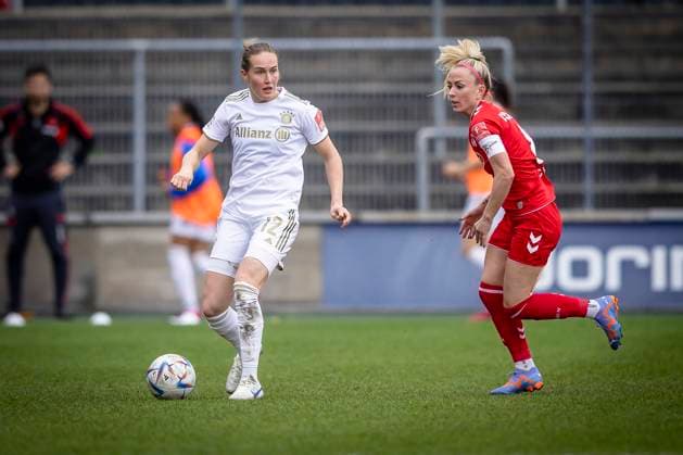 1 Women Bundesliga 1 FC Koeln vs FC Bayern Muenchen, 18 03 2023 Sydney Lohmann FC Bayern Muenchen, 12 , Mandy Islacker 8, 1 FC Koeln during the match 1 FC Koeln vs FC Bayern Muenchen on matchday 15 of the women soccer Bundesliga on 18 03 2023 at Franz Kremer Stadion in Koeln North Rhine Westphalia DFL REGULATES PROHIBIT ANY USE OF PHOTOGRAPHS AS IMAGE SEQUENCES AND OR QUASI VIDEO Copyright: xBEAUTIFULxSPORTS AxelxKohringx