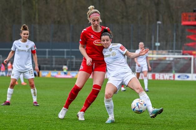 18 03 2023, GER, Football, FLYERALARM Womens Bundesliga 2022 2023, 1 FC Cologne FC Bayern Munich Sharon Beck red jersey, Cologne and Tuva Hansen white jersey, Bayern Munich duel Cologne Franz Kremer Stadium North Rhine Westphalia Germany