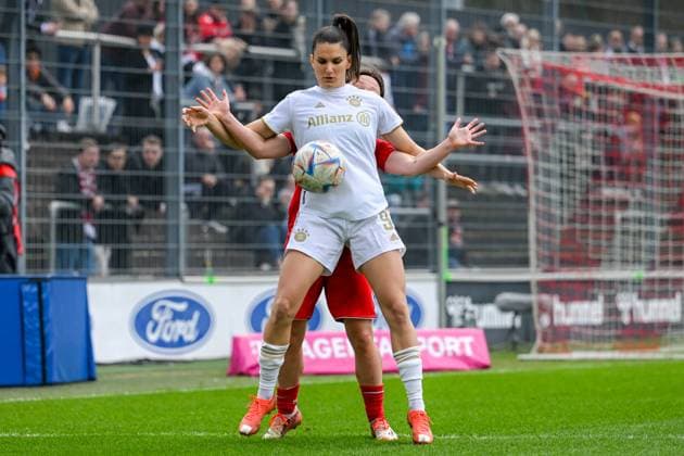 18 03 2023, GER, Soccer, FLYERALARM Womens Bundesliga 2022 2023, 1 FC Cologne FC Bayern Munich Jovana Damnjanovic 9 Bayern Munich shields the ball from Ally Gudorf Cologne Cologne Franz Kremer Stadium North Rhine Westphalia Germany