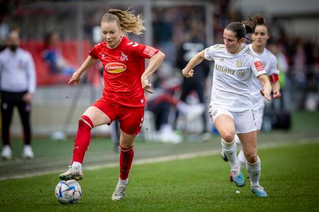 1 Women Bundesliga 1 FC Koeln vs FC Bayern Muenchen, 18 03 2023 Duel between Weronika Zaistowska 24, 1 FC Koeln , Tuva Hansen FC Bayern Muenchen, 6 during the match 1 FC Koeln vs FC Bayern Muenchen on matchday 15 of the Women Football Bundesliga on 18 03 2023 at Franz Kremer Stadium in Koeln North Rhine Westphalia DFL REGULATES PROHIBIT ANY USE OF PHOTOGRAPHS AS IMAGE SEQUENCES AND OR QUASI VIDEO Copyright: xBEAUTIFULxSPORTS AxelxKohringx