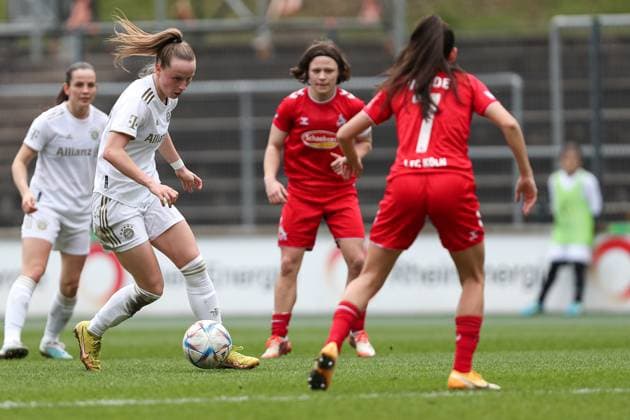 Cologne, Germany, 18 03 2023 Franziska Kett FC Bayern Munich , and Manjou Wilde 1 FC Cologne in a duel , during the Flyeralarm Frauenbundesliga match between 1 FC Cologne and FC Bayern Munich at Franz Kremer Stadium on 18 March 2023 in Cologne Franz Kremer Stadium North Rhine Westphalia Germany Copyright: xOliverxKaelkex