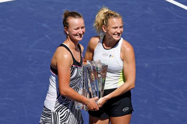 March 18, 2023 Barbora Krejcikova of the Czech Republic,left, and Katerina Siniakova of the Czech Republic pose with the winner s trophy after winning the women s doubles final during the 2023 BNP Paribas Open at Indian Wells Tennis Garden in Indian Wells, California. Mandatory Photo Credit: CSM Indian Wells United States of America - ZUMAc04_ 20230318_zaf_c04_049 Copyright: xCharlesxBausx