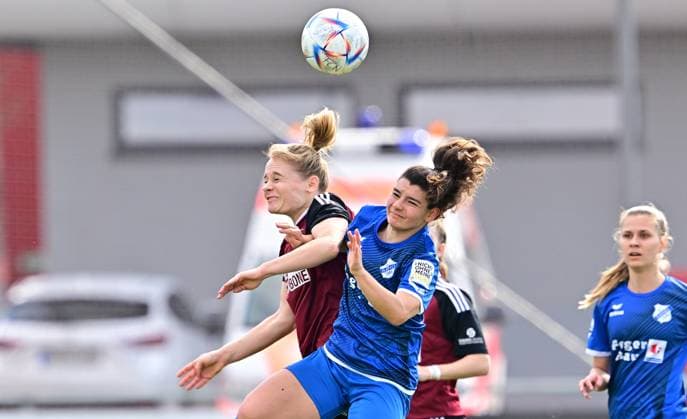 19 03 2023 Football Women Season 2022 2023 2 Bundesliga 17 Matchday 1 FC Nürnberg FCN Club SC Sand Sportfoto Zink regulations prohibit any use of photographs as image sequences and or quasi video Kerstin Bogenschütz Bogenschuetz 8, 1 FC Nürnberg FCN in header duel with Büsra Kuru 7, SC Sand