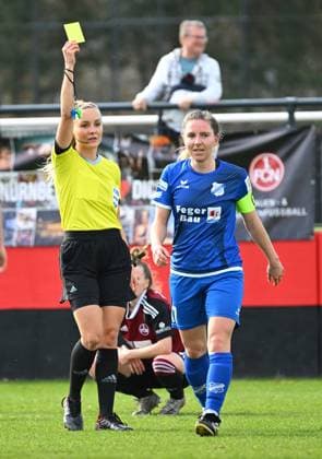 19 03 2023 football women season 2022 2023 2 Bundesliga 17 matchday 1 FC Nürnberg FCN club SC Sand Sportfoto Zink regulations prohibit any use of photographs as image sequences and or quasi video Fabienne Michel referee shows Emily Evels 17, SC Sand yellow card Yellow