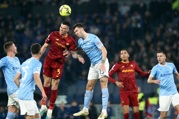 Rome, Italy 19.03.2023: Roger Ibanez (AS ROMA), Alessio Romagnoli (Lazio) in action during the Serie A Championship, football match derby between SS Lazio vs AS Roma at Stadio Olimpico in Rome, Italy.  Copyright: xmarcoxiacobuccix xipa-agency.netx xmarcoxiacobuccix 0 IPA_IPA36836866