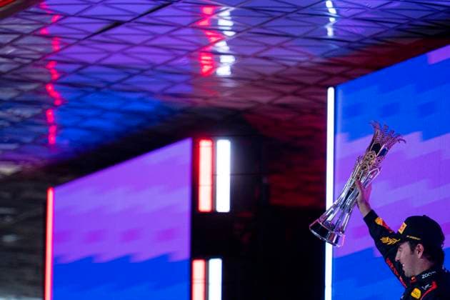 March 19, 2023, Jeddah, Saudi Arabia: SERGIO PEREZ of Mexico and Red Bull Racing on the podium after winning the 2023 FIA Formula 1 Saudi Arabian Grand Prix at Jeddah Corniche Circuit in Jeddah, Saudi Arabia. Jeddah Saudi Arabia - ZUMAg147 20230319_zap_g147_061 Copyright: xJamesxGasperottix
