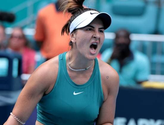 Bianca Andreescu from Canada reacts to winning a game in the third set from Emma Raducanu from Great Britain on opening day of the Miami Open in the Hard Rock Stadium in Miami Gardens, Florida, on Wednesday, March 22, 2023. Andreescu defeated Raducanu 6-3, 3-6, 6-2.  MIA20230322112 GARYxIxROTHSTEIN