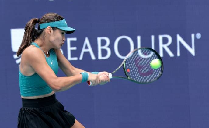 Emma Raducanu from Great Britain returns the ball to Bianca Andreescu from Canada in the third set on opening day of the Miami Open in the Hard Rock Stadium in Miami Gardens, Florida, on Wednesday, March 22, 2023.  MIA20230322116B GARYxIxROTHSTEIN