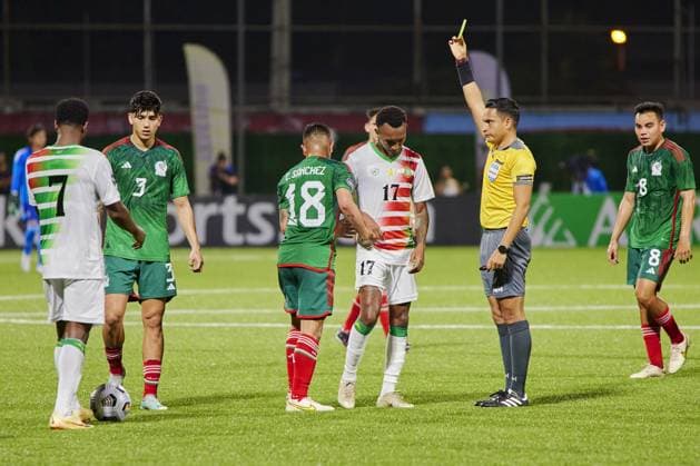 RECORD DATE NOT STATED Referee Said Martinez of Honduras shows yellow card to Erick Sanchez of Mexico during the game Surinam vs Mexico national team, Nationalteam (Mexican National Team), corresponding to Group A of League A of the CONCACAF Nations League 2022-2023, at Dr. Ir. Franklin Essed Stadium, on March 23, 2023. <br><br> Arbitro Said Martinez de Honduras muestra tarjeta amarilla a Erick Sanchez de Mexico durante el partido Surinam vs Mexico (Seleccion Nacional Mexicana), correspondiente al Grupo A de la Liga A de la Liga de Naciones CONCACAF 2022-2023, en el Estadio Dr. Ir. Franklin Essed, el 23 de Marzo de 2023. CONCACAF NATIONS LEAGUE 2022-2023 Surinam vs Mexico 
