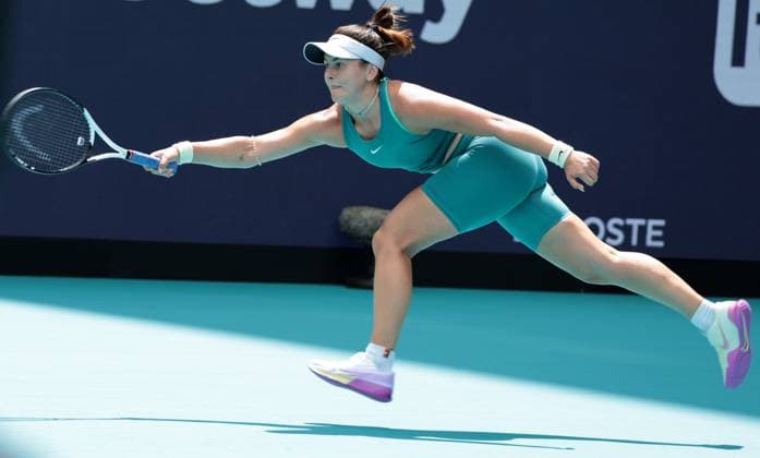 Bianca Andreescu from Canada stretches for the ball to hit a forehand to Maria Sakkara from Greece during day three at the Miami Open in the Hard Rock Stadium in Miami Gardens, Florida, on Friday, March 24, 2023. Andreescu defeated Sakkara 7-7,6-3,6-4.  MIA20230324115 GARYxIxROTHSTEIN