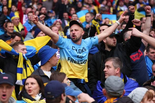 Mandatory Credit: Photo by Shutterstock (13844509v) Ukraine fans react England v Ukraine, UEFA European Championship, EM, Europameisterschaft 2024 Qualifying, Group C, Football, Wembley Stadium, London, UK - 26 Mar 2023 EDITORIAL USE ONLY No use with unauthorised audio, video, data, fixture lists, club league logos or live services. Online in-match use limited to 120 images, no video emulation. No use in betting, games or single club league player publications. England v Ukraine, UEFA European Championship 2024 Qualifying, Group C, Football, Wembley Stadium, London, UK - 26 Mar 2023 EDITORIAL USE ONLY No use with unauthorised audio, video, data, fixture lists, club league logos or live services. Online in-match use limited to 120 images, no video emulation. No use in betting, games or single club league player publications.  Copyright: xShutterstockx 13844509v