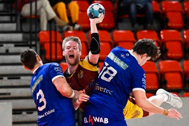 (L-R) Mathias Pedersen of Alingsaas, Jiri Dokoupil of Dukla and Gustav Jonne of Alingsaas in action during the handball European Cup quarterfinal match Dukla Praha vs Alingsaas in Prague, Czech Republic, March 26, 2023. (CTKxPhoto OndrejxDeml) CTKPhotoP2023032605065  CTKPhotoP2023032605065