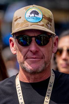 March 26, 2023, Austin, TX, United States of America: LANCE ARMSTRONG enjoys the pre-race festivities prior to the EchoPark Automotive Grand Prix at Circuit Of The Americas (COTA) in Austin, TX. NASCAR, Motorsport, USA Cup Series 2023: EchoPark Automotive Grand Prix - Lance Armstrong  - ZUMAa161 20230326_zaa_a161_036 Copyright: xWalterxG.xArcexSr.x