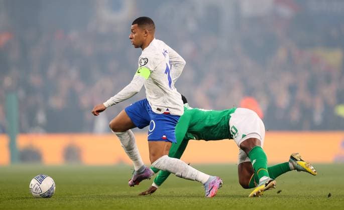UEFA EURO, EM, Europameisterschaft,Fussball 2024 Qualifying Round Group B, Aviva Stadium, Dublin 27 3 2023 Republic of Ireland vs France Ireland™s Chiedozie Ogbene and Kylian MbappÃ Chiedozie Ogbene and Kylian MbappÃ 27 3 2023  Copyright: x INPHO JamesxCrombiex JFD11970