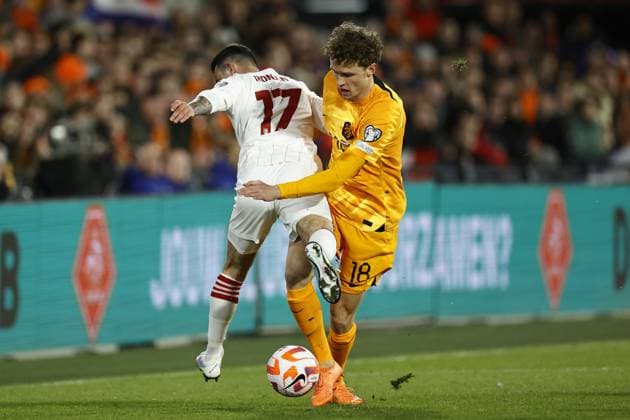 ROTTERDAM - (lr) Kian Ronan of Gibraltar, Mats Wieffer of Holland during the UEFA European Championship, EM, Europameisterschaft Qualifying match between the Netherlands and Gibraltar at Feyenoord Stadion de Kuip on March 27, 2023 in Rotterdam, Netherlands. ANP MAURICE VAN STONE UEFA EURO, EM, Europameisterschaft,Fussball 2024 Qualifying Round 2022 2023 xVIxANPxSportx xxANPxIVx 465879186 originalFilename: 465879186.jpg