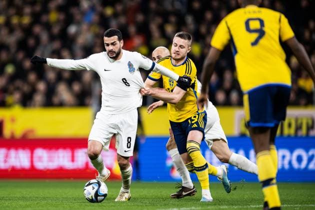 230327 Emin Mahmudov of Azerbaijan and Mattias Svanberg of Sweden during the UEFA Euro Qualifier football match between Sweden and Azerbaijan on March 27, 2023 in Stockholm Photo Jesper Zerman BILDBYRAN COP 234 JZ0347 bbeng football soccer fotdol fotball uefa euro qualifier landskamp emkval em kvaliking em kvalik sweden sweden a sweden azerbaijan,  Copyright: JESPERxZERMAN BB230327JZ012