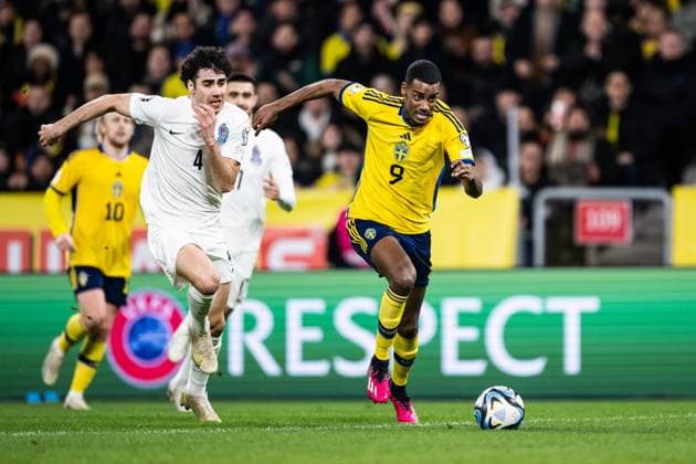 230327 Bahlul Mustafazada of Azerbaijan and Alexander Isak of Sweden during the UEFA Euro Qualifier football match between Sweden and Azerbaijan on March 27, 2023 in Stockholm. sweden a sweden azerbaijan,  Copyright: JESPERxZERMAN BB230327JZ017