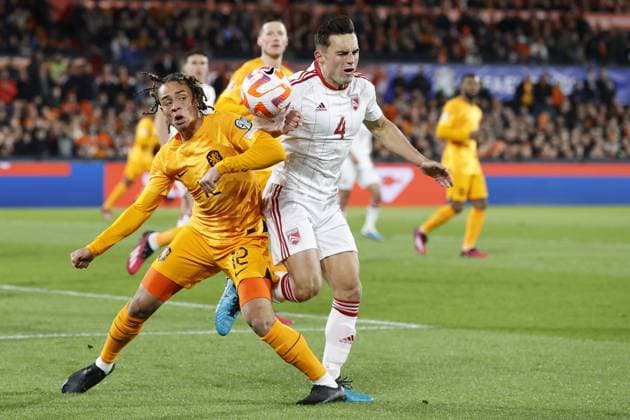 ROTTERDAM , 27-03-2023 , Stadion de Kuip , UEFA Qualification EURO 2024 , season 2022 2023 , match between Netherlands and Gibraltar , (L-R) Netherlands player Xavi Simons, Gibraltar player Jack Sergeant Netherlands - Gibraltar  x20346376x Copyright: