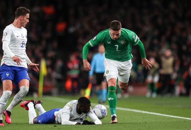 UEFA EURO, EM, Europameisterschaft,Fussball 2024 Qualifying Round Group B, Aviva Stadium, Dublin 27 3 2023 Republic of Ireland vs France France s Benjamin Pavard and Randal Kolo Muani with Matt Doherty of Ireland Benjamin Pavard and Randal Kolo Muani with Matt Doherty 27 3 2023  Copyright: x INPHO RyanxByrnex RB1_6887