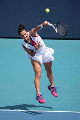 March 27, 2023, Miami Gardens, Florida, United States: March, 27 - Miami Gardens: Martina Trevisan of Italy plays Jelena Ostapenko of Latvia during the round of 16 at the 2023 Miami Open by Itau. Miami Gardens USA - ZUMApa3_ 20230327_zap_pa3_010 Copyright: xAndrewxPatronx