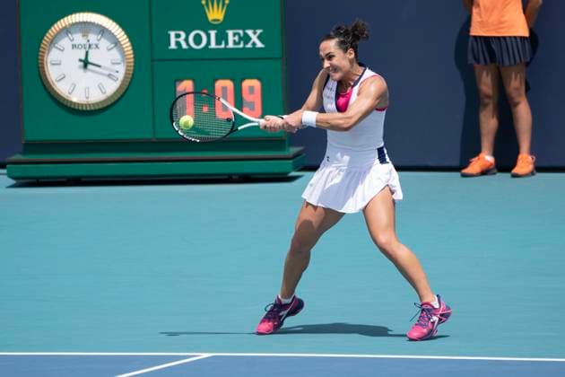 March 27, 2023, Miami Gardens, Florida, United States: March, 27 - Miami Gardens: Martina Trevisan of Italy plays Jelena Ostapenko of Latvia during the round of 16 at the 2023 Miami Open by Itau. Miami Gardens USA - ZUMApa3_ 20230327_zap_pa3_009 Copyright: xAndrewxPatronx