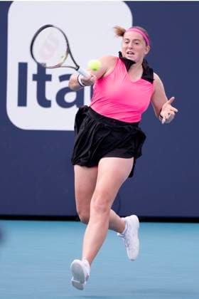 March 27, 2023, Miami Gardens, Florida, United States: March, 27 - Miami Gardens: Martina Trevisan of Italy plays Jelena Ostapenko of Latvia during the round of 16 at the 2023 Miami Open by Itau. Miami Gardens USA - ZUMApa3_ 20230327_zap_pa3_005 Copyright: xAndrewxPatronx