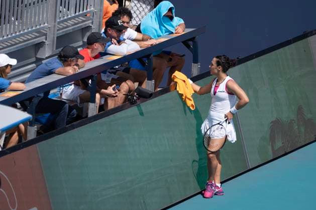 March 27, 2023, Miami Gardens, Florida, United States: March, 27 - Miami Gardens: Martina Trevisan of Italy plays Jelena Ostapenko of Latvia during the round of 16 at the 2023 Miami Open by Itau. Miami Gardens USA - ZUMApa3_ 20230327_zap_pa3_007 Copyright: xAndrewxPatronx