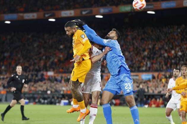 ROTTERDAM , 27-03-2023 , Stadion de Kuip , UEFA Qualification EURO 2024 , season 2022 2023 , match between Netherlands and Gibraltar , (L-R) Netherlands player Memphis Depay scores 1-0 , Gibraltar player Graeme Torrilla Netherlands - Gibraltar  x20346413x Copyright:
