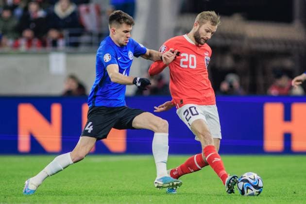 SOCCER - UEFA EURO, EM, Europameisterschaft,Fussball 2024 Quali, AUT vs EST LINZ,AUSTRIA,24.MAR.27 - SOCCER - European Qualifiers 2024, OEFB international match, Länderspiel, Nationalmannschaft Austria vs Estland. Image shows Mattias Kaeit (EST) and Konrad Laimer (AUT).  GEPAxpictures xManuelxBinder