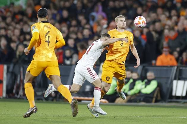 ROTTERDAM , 27-03-2023 , Stadion de Kuip , UEFA Qualification EURO 2024 , season 2022 2023 , match between Netherlands and Gibraltar , (L-R) Netherlands player Virgil van Dijk, Gibraltar player Jamie Coombes, Netherlands player Matthijs de Ligt Netherlands - Gibraltar  x20346480x Copyright: