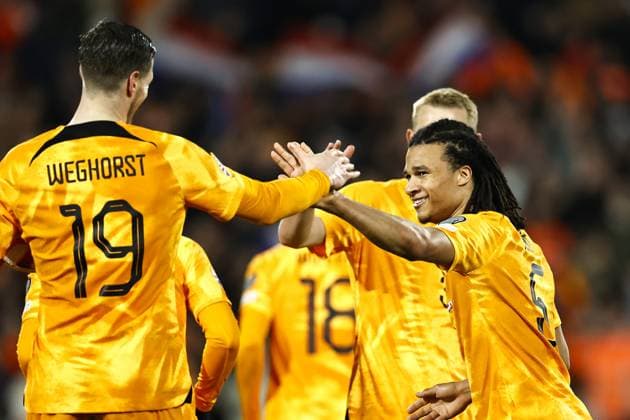 ROTTERDAM - (lr) Wout Weghorst of Holland, Nathan Ake of Holland celebrate the 2-0 during the UEFA European Championship, EM, Europameisterschaft qualifying match between the Netherlands and Gibraltar at Feyenoord Stadion de Kuip on March 27, 2023 in Rotterdam, Netherlands. ANP MAURICE VAN STONE UEFA EURO, EM, Europameisterschaft,Fussball 2024 Qualifying Round 2022 2023 xVIxANPxSportx xxANPxIVx 465882351 originalFilename: 465882351.jpg