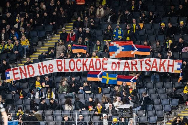 230327 A protest banner in the stands during the UEFA Euro Qualifier football match between Sweden and Azerbaijan on March 27, 2023 in Stockholm. azerbaijan audience,  Copyright: JESPERxZERMAN BB230327JZ038