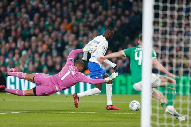 27th March 2023; Aviva Stadium, Dublin, Ireland: Euro 2024 Qualifier Football, Republic of Ireland versus France; Randal Kolo Muani of France is stopped in front of the goal by Gavin Bazunu and Dara O Shea of Ireland  ActionPlus12491370 PeterxFitzpatrick