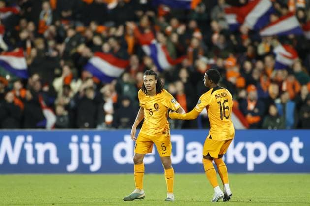 ROTTERDAM , 27-03-2023 , Stadion de Kuip , UEFA Qualification EURO 2024 , season 2022 2023 , match between Netherlands and Gibraltar , (L-R) Netherlands player Nathan Ake, Netherlands player Tyrell Malacia celebrating 3-0 Netherlands - Gibraltar  x20346891x Copyright: