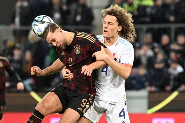 28 03 2023, xjhx, football Laenderspiel, Germany Belgium emspor, v l Niclas Füllkrug Fuellkrug Deutsche Fussball Nationalmannschaft DFB Wout Faes Belgium Zweikampf, action, battle for the ball DFL DFB REGULATIONS PROHIBIT ANY USE OF PHOTOGRAPHS AS IMAGE SEQUENCES AND OR QUASI VIDEO Koeln