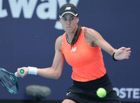 Unranked Sorana Cirstea from Romania hits a forehand shot to No. 2 in the world Aryna Sabalenka from Belarus in the quarter-final match at the Miami Open in the Hard Rock Stadium in Miami Gardens, Florida, on Wednesday, March 29, 2023. Cirstea upsets Sabalenka 6-4, 6-4.  MIA20230329118 GARYxIxROTHSTEIN