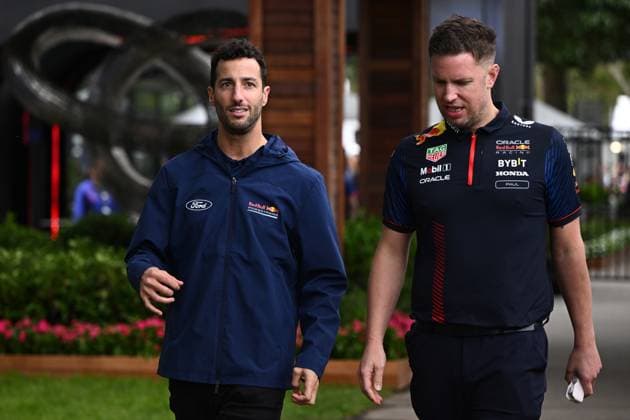 AUSTRALIAN F1 GRAND PRIX, Red Bull Racing reserve driver Daniel Ricciardo (left) in the paddock during the Albert Park Grand Prix Circuit in Melbourne, Thursday, March 30, 2023. ( NO ARCHIVING, EDITORIAL USE ONLY, NO USE IN BOOKS WITHOUT CONSENT MELBOURNE VIC AUSTRALIA  Copyright: xJOELxCARRETTx 20230330001780763300