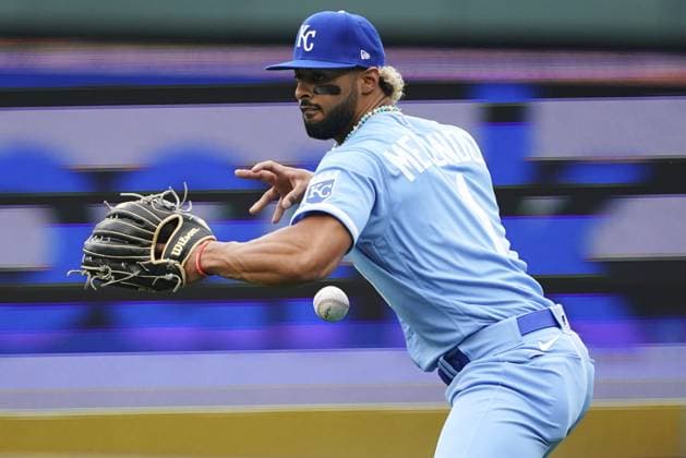 Kansas City Royals right fielder MJ Melendez (1) loses his grip on the ball while attempting to throw a Minnesota Twins runner out at first during the Opening Day at Kauffman Stadium in Kansas City, Missouri on Thursday, March 30, 2023.  KCP20230330110 KYLExRIVAS