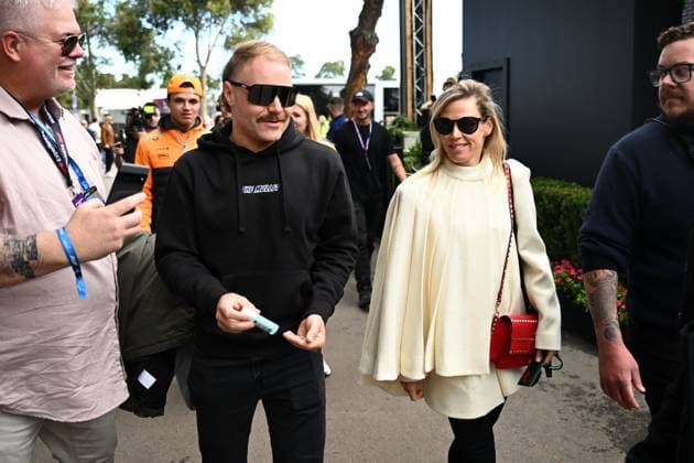 SUPERCARS MELBOURNE 400, Valtteri Bottas of Alfa Romeo (left) and partner Tiffany Cromwell on arrival during the Formula 1 Australian Grand Prix at the Albert Park Circuit in Melbourne, Friday, March 31, 2023. ( NO ARCHIVING, EDITORIAL USE ONLY, NO USE IN BOOKS WITHOUT CONSENT MELBOURNE VICTORIA AUSTRALIA  Copyright: xJOELxCARRETTx 20230331001781083862